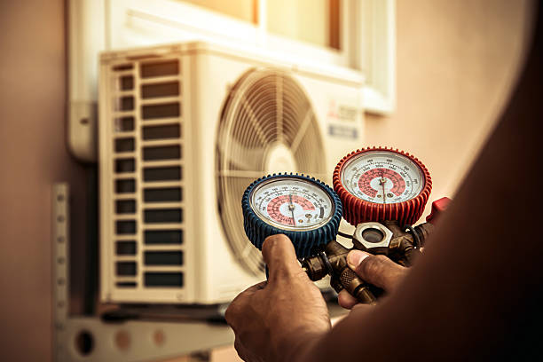 Professional Hvac Installation technician working in Mansfield Center, MA